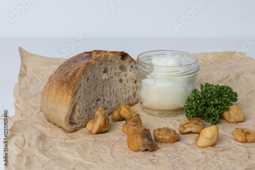 Czech specialty - pork meat products for eating..Homemade tlacenka, jitrnice, cracklings, bread, fried lard photo