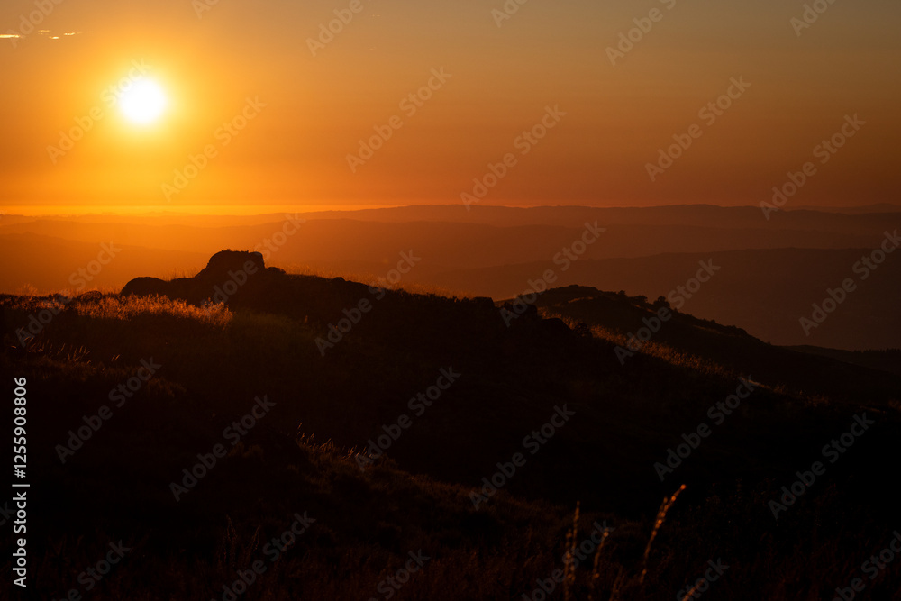 Amazing bright sunset over rocky mountains, Portugal Amazing bright sunset over rocky mountains, Portugal