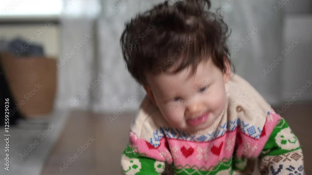 happy biracial baby boy infant playfully crawling around the room towards the camera. happy biracial baby boy infant playfully crawling around the room towards the camera.