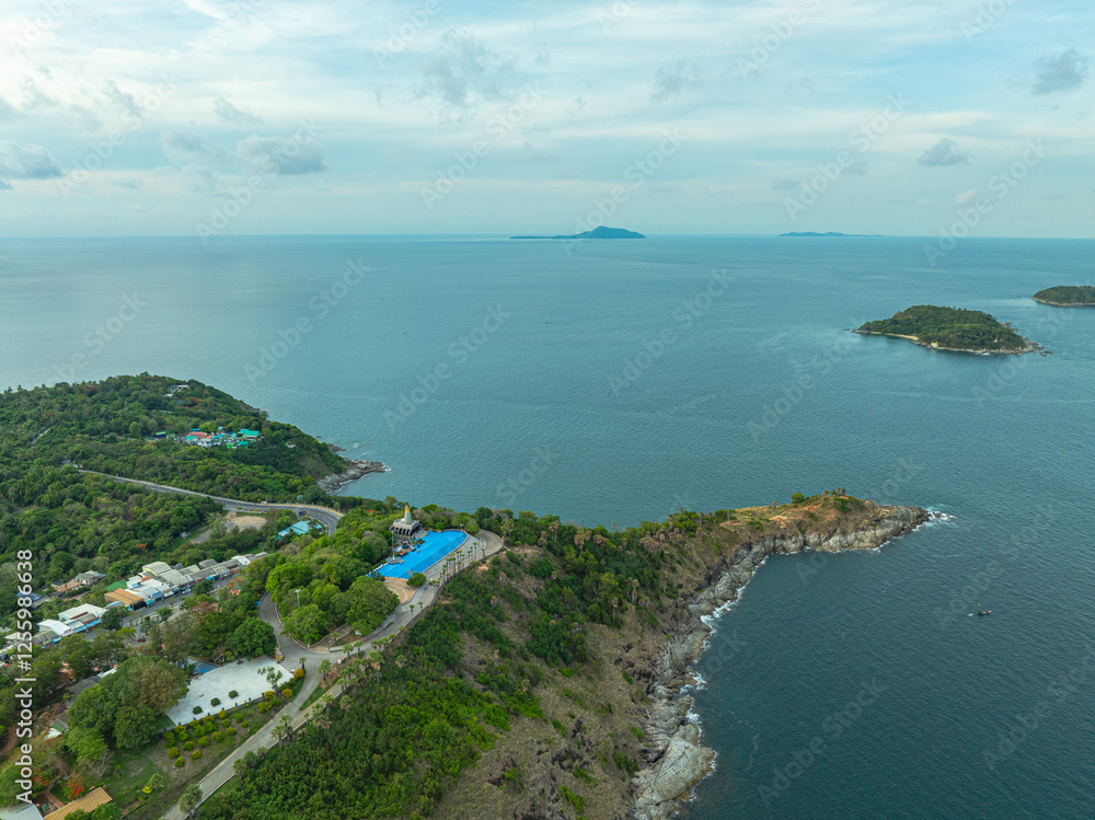 Obraz premium aerial view at Laem Promthep Cape viewpoint. Promthep cape is the most popular viewpoint in Phuket..Man island, Yanui beach small beach and wind turbine are also a sunset viewing spot..