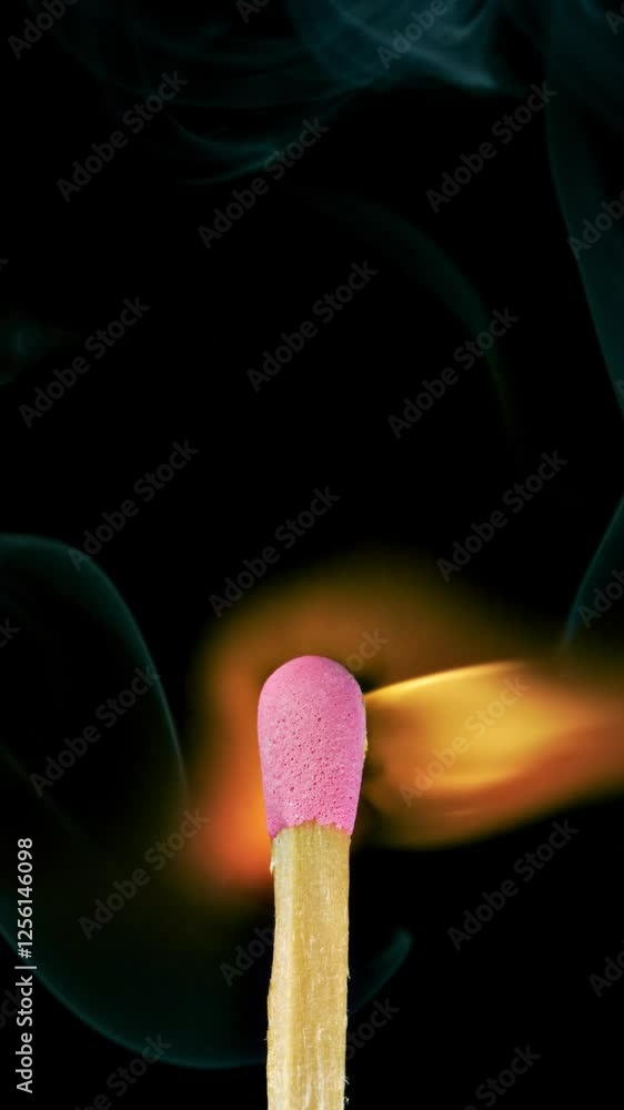 Super Slow motion macro shot of wooden match igniting. Vertical Video. Super Slow motion macro shot of wooden match igniting. Vertical Video.