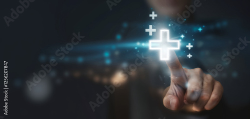 Businessman touching to plus sign mark for value added , It is symbol of business profit growth , health insurance , benefit and economy development concept.