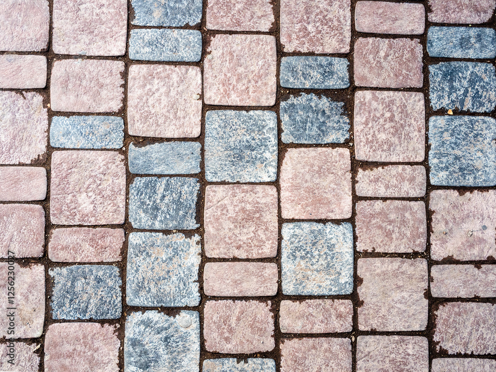 brown and gray stone tiles on path surface brown and gray stone tiles on path surface