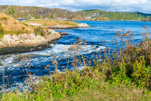 A close up view of the reversing falls at Saint John, New Brunswick in the fall photo