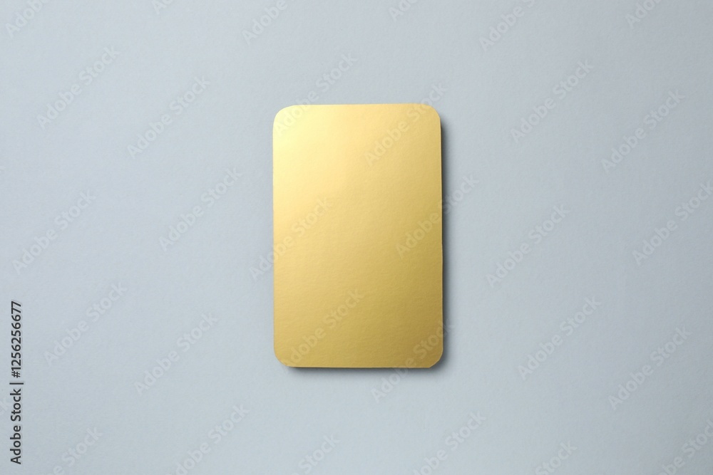 Golden card on gray background Golden card on gray background