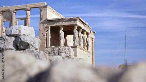 Temple of Athena Nike with columns on Acropolis hill. Ancient temple, historic landmark. Popular travel destination in Europe.