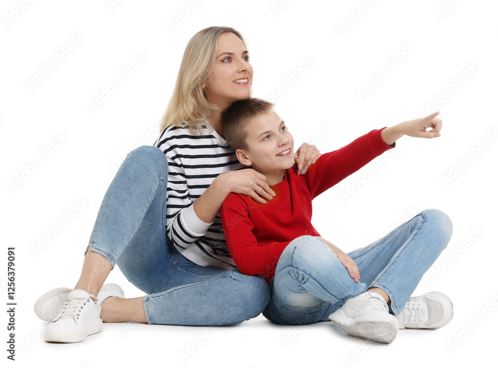 Son showing his mother something on white background Son showing his mother something on white background