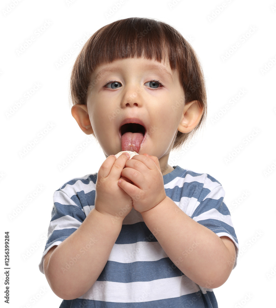 Cute little child eating tasty mochi on white background Cute little child eating tasty mochi on white background