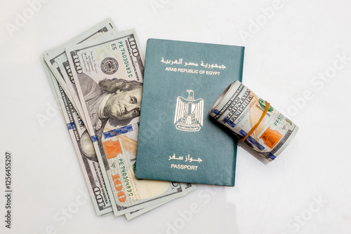 Egyptian Passport with Euro and US Dollars Banknotes, Migration Concept, on White Background