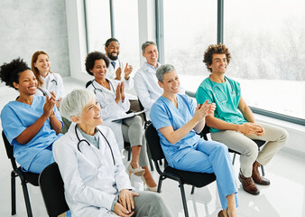 seminar business meeting doctor conference audience presentation education lecture hospital event training clapping applauding happy smiling group convention congress speech student