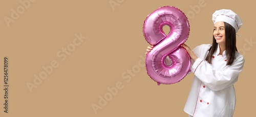 Female chef holding balloon...