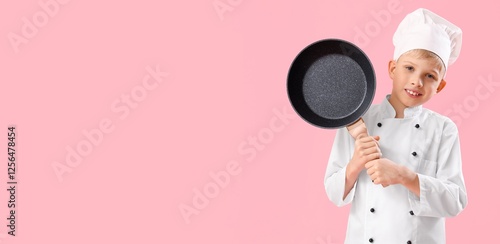 Cute little chef with fryin...