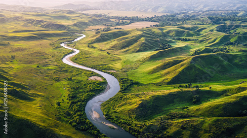 Stunning Aerial Photography of Meandering River and Rolling Hills Amidst Lush Greenery in a Picturesque Rural Landscape – Perfect for Tranquil Nature Exploration and Sustainable Travel photo