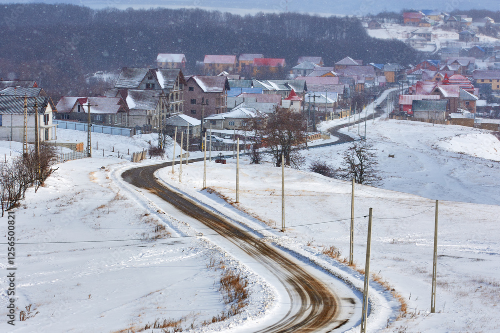 High voltage poles in the field in winter