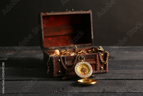 Old chest with treasures an...