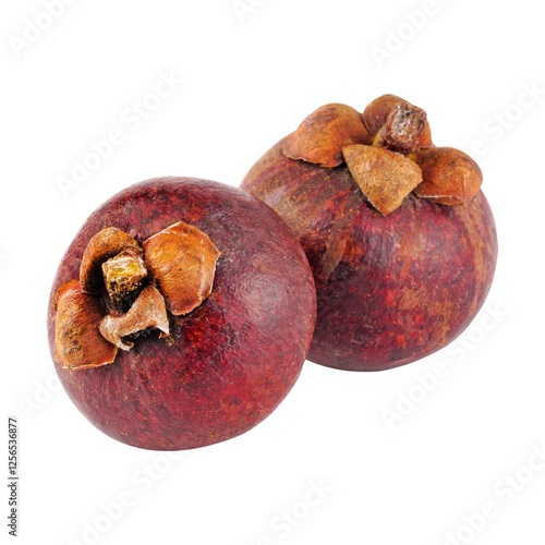 Two whole mangosteen fruits with a deep purple rind isolated on white background.
 photo