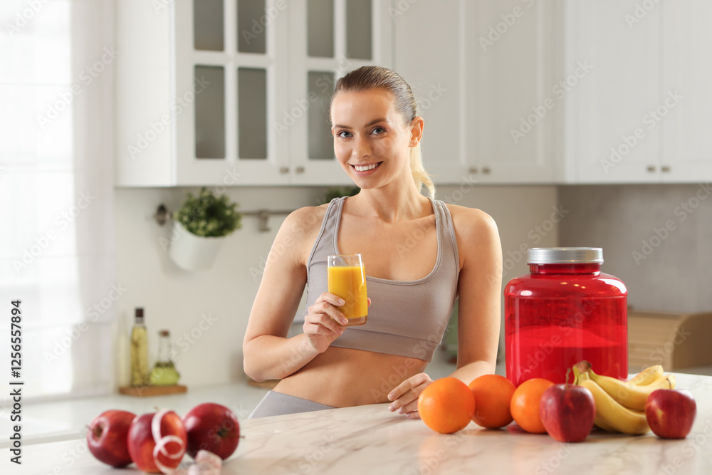 Weight loss. Happy woman with tasty shake at white marble table in kitchen Weight loss. Happy woman with tasty shake at white marble table in kitchen