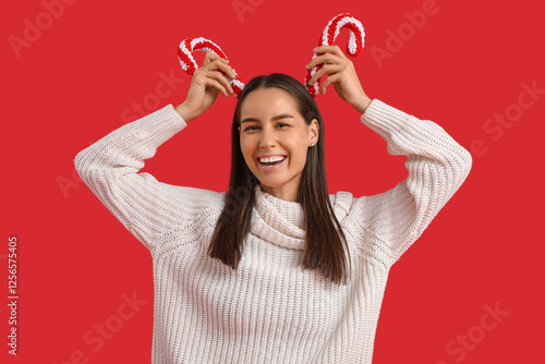 Happy young woman with Chri...