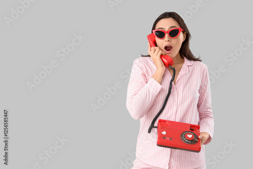 Shocked young woman in stri...