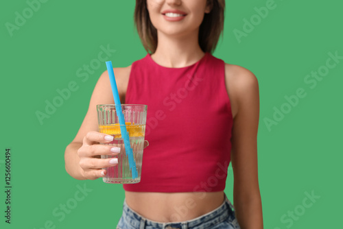 Young woman with glass of l...