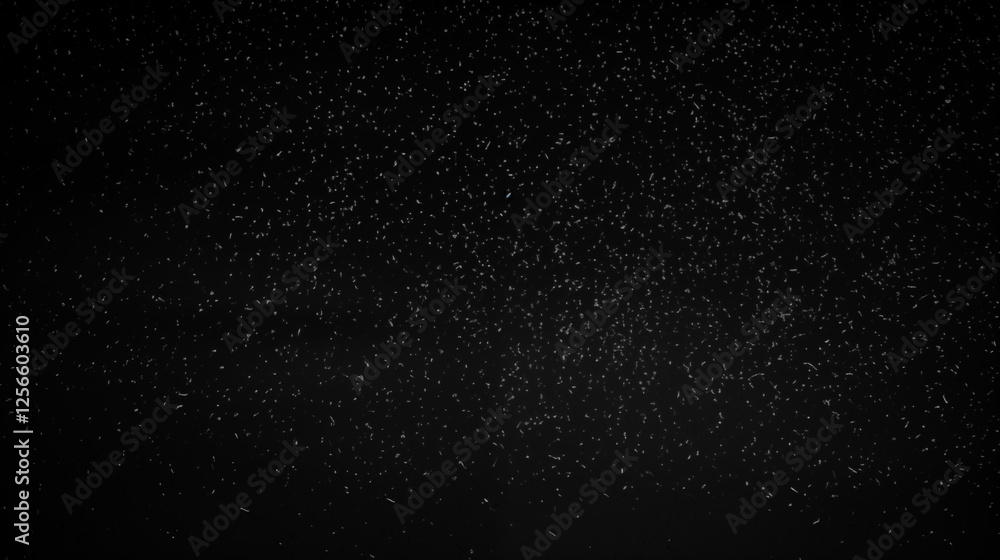 Fototapeta premium Particules et étoiles scintillantes et brillantes volant sur fond sombre, noir. Lumière, étoile, paillette dorée et flou. Cosmos, univers, espace. Fond pour bannière, conception et création graphique.
