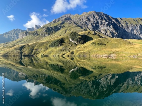 The alpine lake Melchsee or Melch Lake in the Uri Alps mountain massif, Kerns - Canton of Obwalden, Switzerland (Kanton Obwald, Schweiz) photo