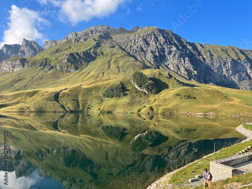 The alpine lake Melchsee or Melch Lake in the Uri Alps mountain massif, Kerns - Canton of Obwalden, Switzerland (Kanton Obwald, Schweiz) photo