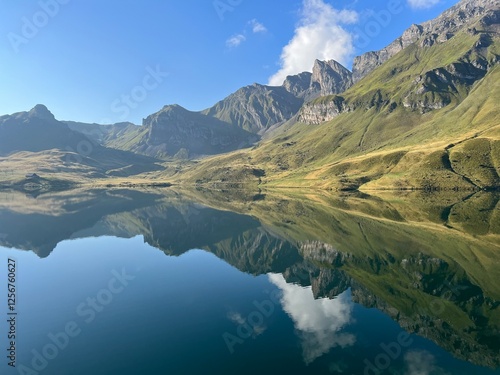 The alpine lake Melchsee or Melch Lake in the Uri Alps mountain massif, Kerns - Canton of Obwalden, Switzerland (Kanton Obwald, Schweiz) photo