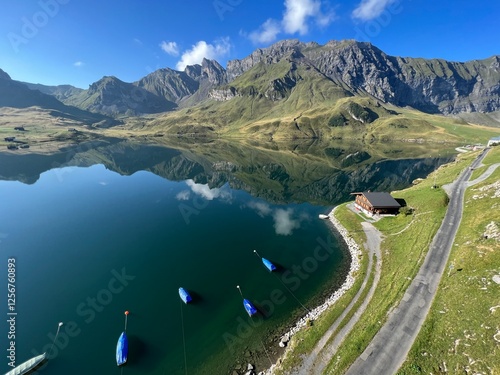 The alpine lake Melchsee or Melch Lake in the Uri Alps mountain massif, Kerns - Canton of Obwalden, Switzerland (Kanton Obwald, Schweiz) photo