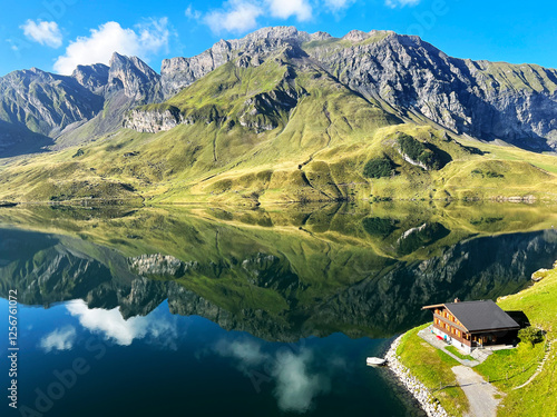 The alpine lake Melchsee or Melch Lake in the Uri Alps mountain massif, Kerns - Canton of Obwalden, Switzerland (Kanton Obwald, Schweiz) photo