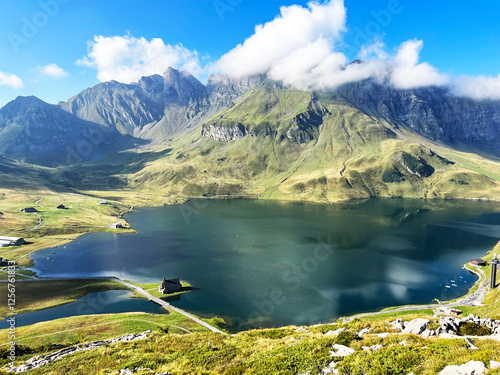 The alpine lake Melchsee or Melch Lake in the Uri Alps mountain massif, Kerns - Canton of Obwalden, Switzerland (Kanton Obwald, Schweiz) photo