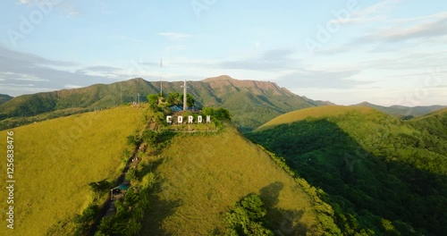 A large Cross in Mount Tapyas Viewdeck, view from drone. Coron, Palawan. Philippines. photo