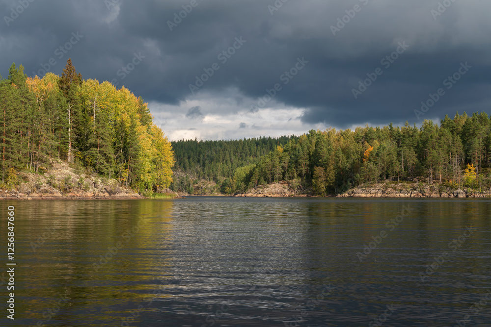 Fototapeta premium Lake Ladoga near the village Lumivaara on a sunny autumn day, Ladoga skerries, Lakhdenpokhya, Republic of Karelia, Russia
