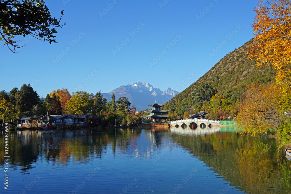 Black dragon pool in Lijiang Ancient Town with best views of Jade Dragon Snow Mountain. Famous travelling destination in Yunnan province, China Black dragon pool in Lijiang Ancient Town with best views of Jade Dragon Snow Mountain. Famous travelling destination in Yunnan province, China