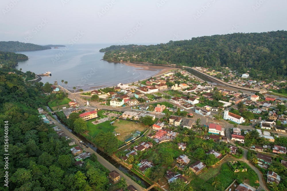 Aerial view from Santo Antonio city, the capital of Ilha do Principe, with the sea in the background Aerial view from Santo Antonio city, the capital of Ilha do Principe, with the sea in the background