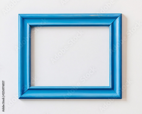 blue picture frame isolated on white wall background