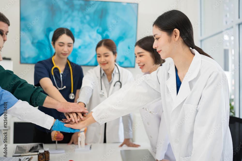 Male and female doctors are having a meeting in a hospital room. Male and female doctors are having a meeting in a hospital room.