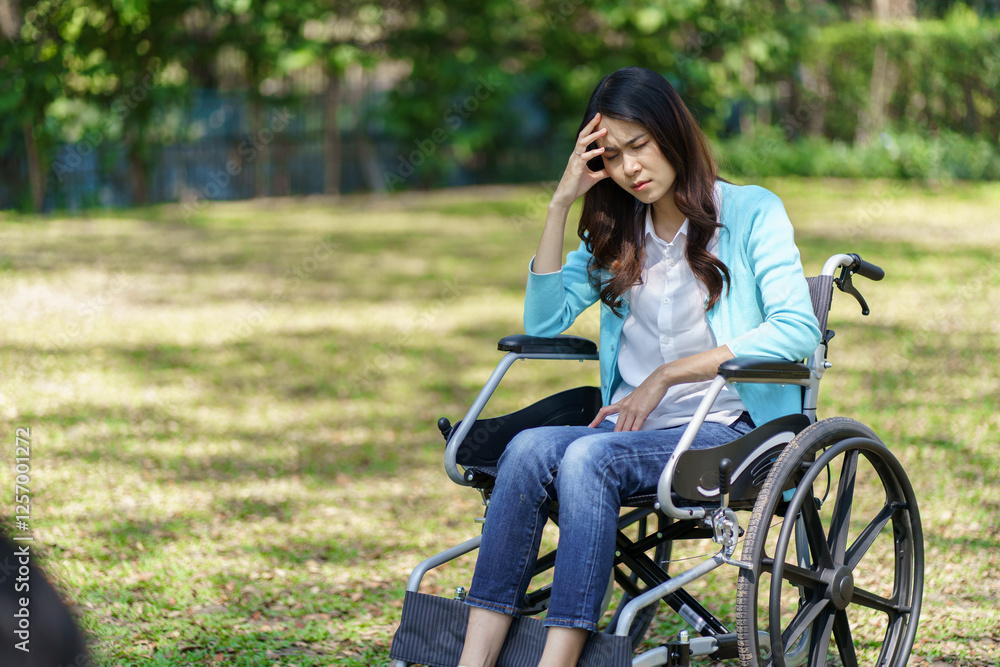Φωτογραφία Depressed sad asian woman in wheelchair lonely disabled adult