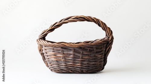 Simple Wicker Basket on White Background for Sale photo