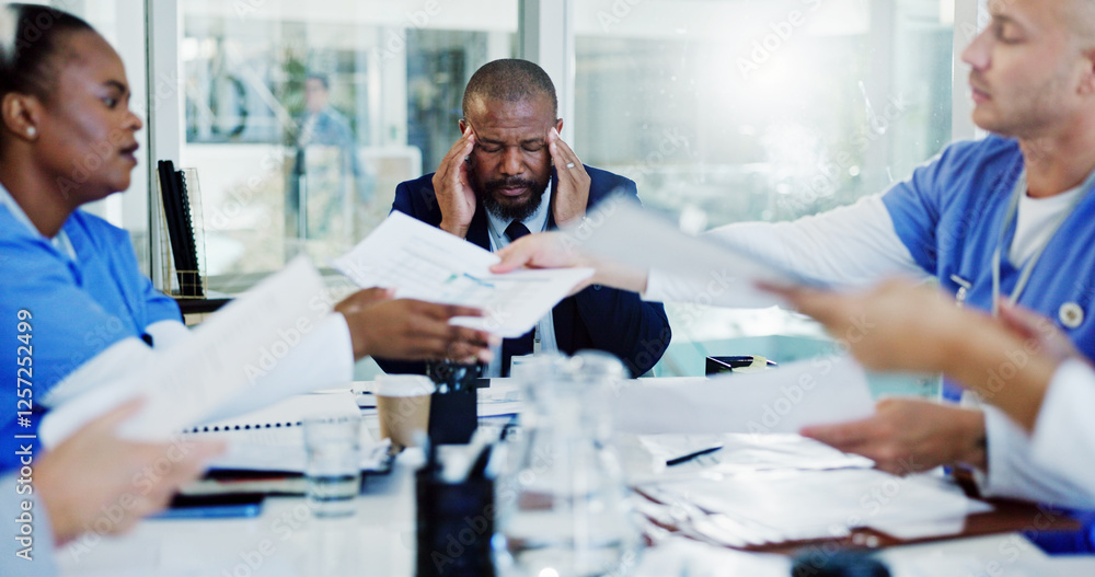 Frustrated man, doctor or headache with documents in meeting for overworked stress or anxiety at hospital. Businessman, board director or fatigue with migraine for clinic chaos or bad medical funding
