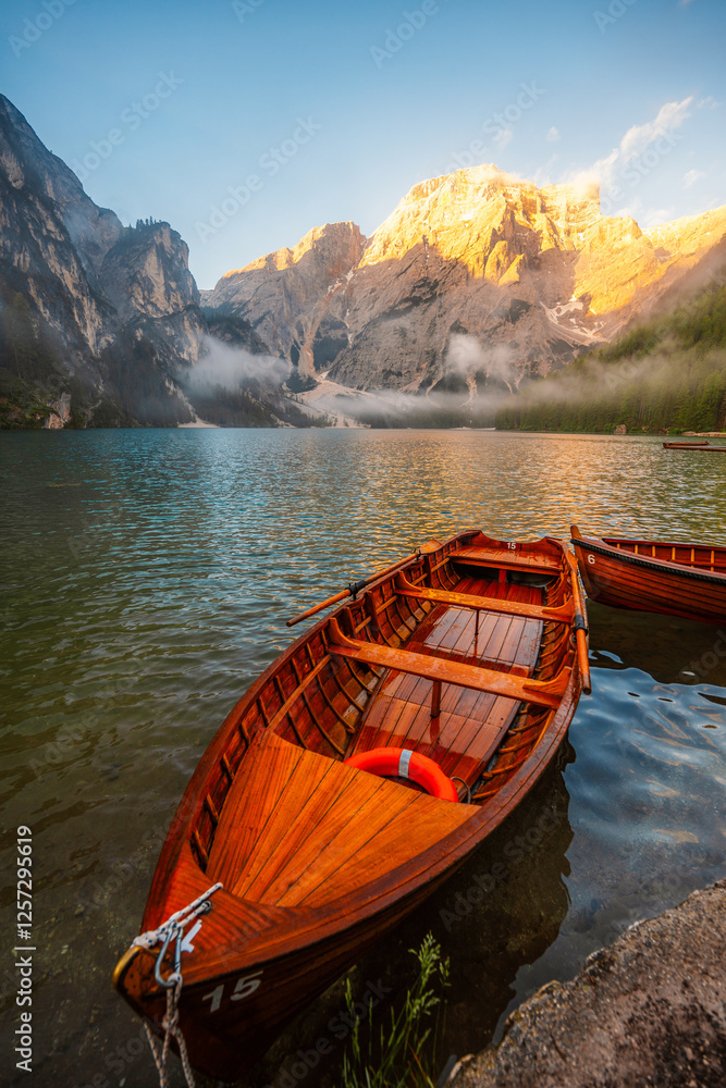 Fototapeta premium Lago di Braies or Pragser Wildsee lake with boats and fishing dock.Fanes-Sennes-Braies national park in Dolomiti Alps, South Tyrol, Italy