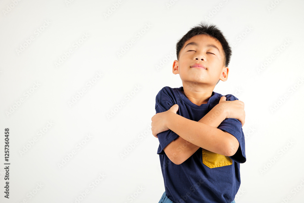 Happy young child smiling Asian boy hugging herself remember a moment studio short isolated on white background, Self care and self esteem concept, Lifestyle primary kid love yourself carefree Happy young child smiling Asian boy hugging herself remember a moment studio short isolated on white background, Self care and self esteem concept, Lifestyle primary kid love yourself carefree