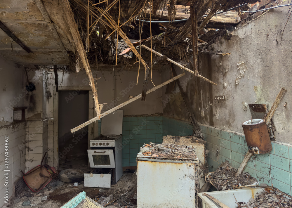 old abandoned house with a collapsed roof
