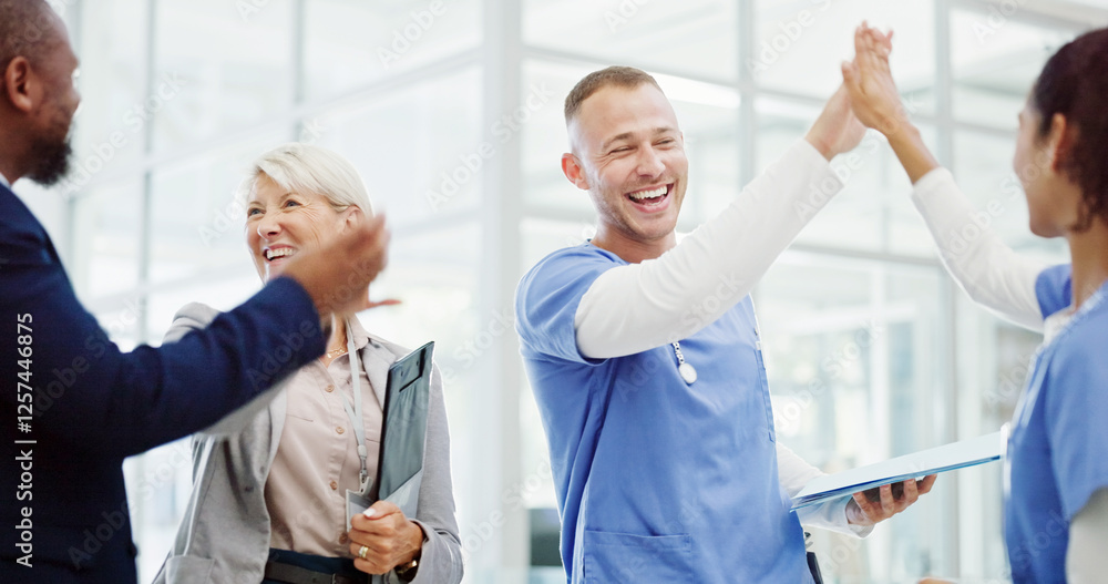 Obraz premium Doctors, high five and celebration with team at clinic for breakthrough, progress and medical solution. People, men and women with cheers, success and goals for healthcare innovation at hospital