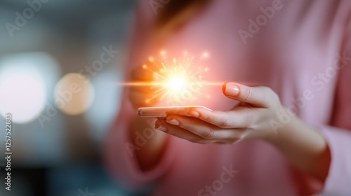 woman holding glowing cell phone