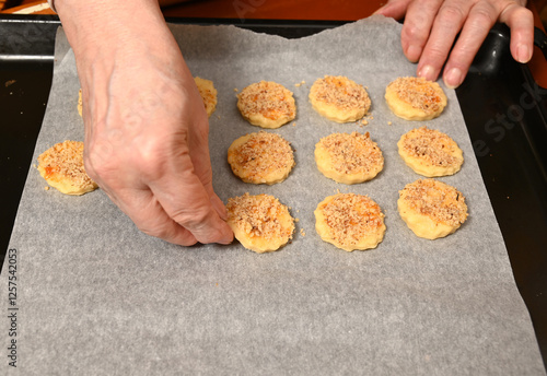 Obraz na płótnie Baking delicious cookies with a homemade crumb topping in a cozy kitchen w salonie