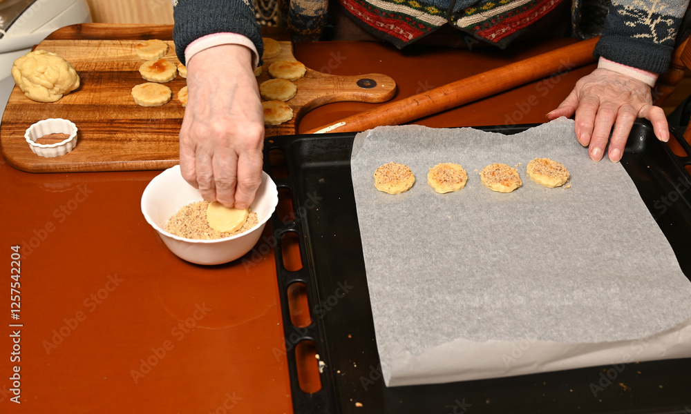 Baking cookies with a family recipe in a cozy kitchen during winter