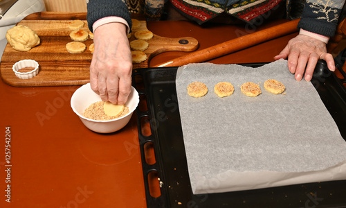 Obraz na płótnie Baking cookies with a family recipe in a cozy kitchen during winter w salonie