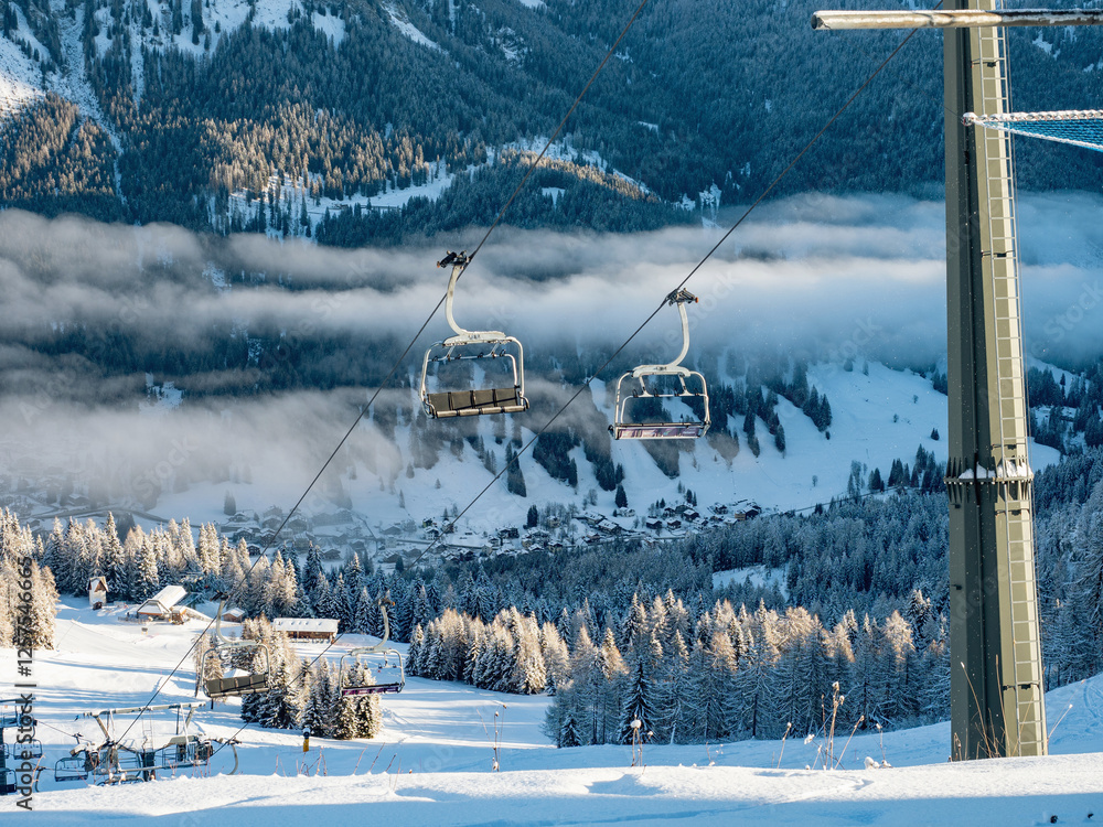 Skiing on the Dolomites Civetta resort On a beautiful sunny day. Italy