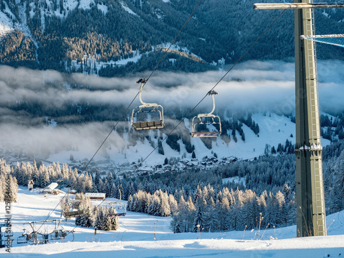 Obraz na płótnie Skiing on the Dolomites Civetta resort On a beautiful sunny day. Italy w salonie